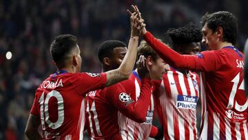 Correa y Savic celebrando el gol del 2-0 al Mónaco que marcó Griezmann.