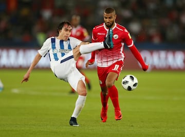 Soccer Football - FIFA Club World Cup - CF Pachuca vs Wydad AC - Zayed Sports City Stadium, Abu Dhabi, United Arab Emirates - December 9, 2017   Pachuca's Joaquin Martinez in action with Wydad’s Ismail El Haddad    REUTERS/Amr Abdallah Dalsh