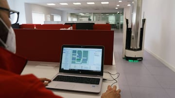 A ZenZoe Robot disinfects a factory with ultraviolet light (UV-C) in Madrigalejo del Monte, near Burgos, on May 12, 2020. - ASTI Mobile Robotics and BOOS Technical Lighting have developed a mobile disinfection solution against coronavirus named ZenZoe ro