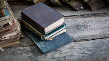 Vintage old books on wooden table