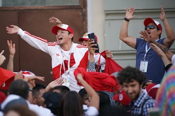 MOSCOW, RUSSIA - JUNE 15:  Football fans from Peru sing songs and enjoy the party atmosphere of The World Cup in Nikolskaya Street, near Red Square on June 15, 2018 in Moscow, Russia. Russia won the opening game of the tournament against Saudi Arabia 5-0.  (Photo by Christopher Furlong/Getty Images)