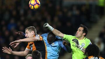 Britain Soccer Football - Hull City v Manchester City - Premier League - The Kingston Communications Stadium - 26/12/16 Hull City's Michael Dawson in action with Manchester City's Claudio Bravo Reuters / Scott Heppell Livepic EDITORIAL USE ONLY. No use with unauthorized audio, video, data, fixture lists, club/league logos or "live" services. Online in-match use limited to 45 images, no video emulation. No use in betting, games or single club/league/player publications. Please contact your account representative for further details.
