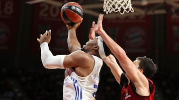 MUNICH, GERMANY - NOVEMBER 05: Guerschon Yabusele  #28 of Real Madrid Vladimir Lucic #11 of FC Bayern Munich in action during the Turkish Airlines EuroLeague Regular Season Round 8 match between FC Bayern Munich and Real Madrid at Audi Dome on November 05, 2021 in Munich, Germany. (Photo by Christina Pahnke/Euroleague Basketball via Getty Images)