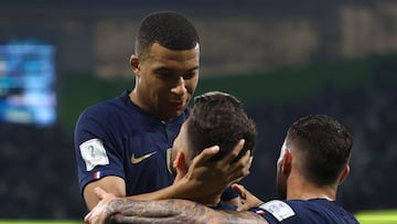 Soccer Football - FIFA World Cup Qatar 2022 - Round of 16 - France v Poland - Al Thumama Stadium, Doha, Qatar - December 4, 2022 France's Olivier Giroud celebrates scoring their first goal with teammates Kylian Mbappe and Theo Hernandez REUTERS/Hannah Mckay