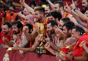 Spain's players with the trophy.