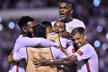 Honduran Olimpia players celebrate one of the goals against Atlas in the Convcacaf Champions League.
