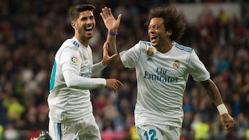 Asensio y Marcelo festejan el gol del balear.