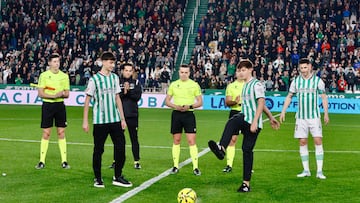 Julio y José en el saque de honor