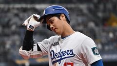 Los Angeles Dodgers' Shohei Ohtani reacts after flying out in the 7th inning of the 2024 MLB Seoul Series baseball game 2 between Los Angeles Dodgers and San Diego Padres at the Gocheok Sky Dome in Seoul on March 21, 2024. (Photo by Jung Yeon-je / AFP)