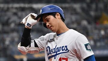 Los Angeles Dodgers' Shohei Ohtani reacts after flying out in the 7th inning of the 2024 MLB Seoul Series baseball game 2 between Los Angeles Dodgers and San Diego Padres at the Gocheok Sky Dome in Seoul on March 21, 2024. (Photo by Jung Yeon-je / AFP)