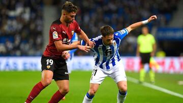 Januzaj, con Hugo Duro