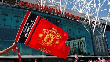 FILE PHOTO: Soccer Football - Premier League - Manchester United v Crystal Palace - Old Trafford, Manchester, Britain - August 24, 2019 General view as Manchester United fans wave a flag outside the stadium before the match Action Images via Reuters/Paul