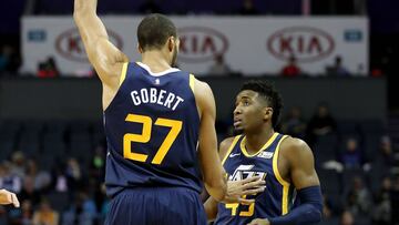 CHARLOTTE, NC - NOVEMBER 30: Rudy Gobert #27 of the Utah Jazz talks to teammate Donovan Mitchell #45 of the Utah Jazz during their game at Spectrum Center on November 30, 2018 in Charlotte, North Carolina. NOTE TO USER: User expressly acknowledges and agrees that, by downloading and or using this photograph, User is consenting to the terms and conditions of the Getty Images License Agreement. Streeter Lecka/Getty Images/AFP
== FOR NEWSPAPERS, INTERNET, TELCOS & TELEVISION USE ONLY ==