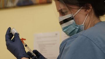 NEW YORK, NEW YORK - FEBRUARY 10: A medical worker prepares the Moderna Covid-19 vaccination at a vaccination site at Stevenson Family Health Center in the Bronx on February 10, 2021 in New York City. The health center, which is part of the Institute for Family Health, administers dozens of vaccine shots and Covid tests daily in a neighborhood with a large Hispanic and African American population. New York City is now giving vaccinations to the elderly, first responders, workers in the restaurant industry and others. While thousands continue to die daily from COVID-19, cases are declining throughout the United States. Spencer Platt/Getty Images/AFP
== FOR NEWSPAPERS, INTERNET, TELCOS & TELEVISION USE ONLY ==