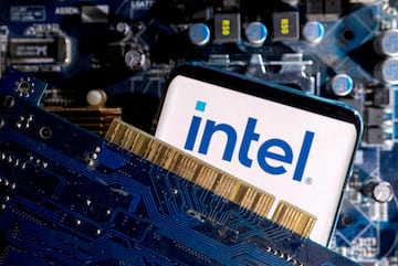 FILE PHOTO: A smartphone with a displayed Intel logo is placed on a computer motherboard in this illustration taken March 6, 2023. REUTERS/Dado Ruvic/Illustration/File Photo