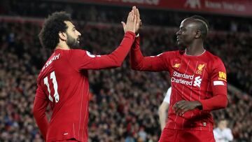 Salah y Mané celebran un gol.