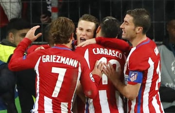 Atletico Madrid's Kevin Gameiro celebrates scoring their third goal from the penalty spot with Antoine Griezmann