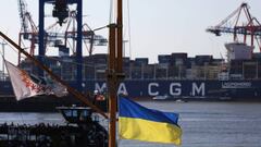 A Ukraine flag flying near the LNG Powered CMA CGM Montmartre container ship at the Port of Hamburg in Hamburg, Germany, on Wednesday, Aug. 24, 2022. Germany'slogistics problems are worsening an economic slowdown, with shallow rivers exposing fragile inland supply routes, an under-invested railway system that can't take on the extra capacity, and seaports that are still heaving with cargo. Photographer: Krisztian Bocsi/Bloomberg via Getty Images