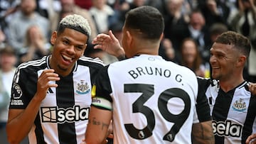 Newcastle United's Danish striker #18 William Osula celebrates scoring the team's third goal with Newcastle United's Brazilian midfielder #39 Bruno Guimaraes (C) and Newcastle United's English defender #02 Kieran Trippierduring the English Premier League football match between Newcastle United and Ipswich Town at St James' Park in Newcastle-upon-Tyne, north east England on April 26, 2025. (Photo by Paul ELLIS / AFP) / RESTRICTED TO EDITORIAL USE. No use with unauthorized audio, video, data, fixture lists, club/league logos or 'live' services. Online in-match use limited to 120 images. An additional 40 images may be used in extra time. No video emulation. Social media in-match use limited to 120 images. An additional 40 images may be used in extra time. No use in betting publications, games or single club/league/player publications. /