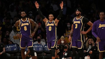 FILE PHOTO: Oct 29, 2021; Los Angeles, California, USA; Los Angeles Lakers forward LeBron James (6) guard Russell Westbrook (0) and forward Anthony Davis (3) watch game action against the Cleveland Cavaliers during the second half at Staples Center.