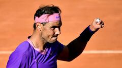 Spain&#039;s Rafael Nadal celebrates defeating Canada&#039;s Denis Shapovalov after their match of the Men&#039;s Italian Open at Foro Italico on May 13, 2021 in Rome, Italy. (Photo by Filippo MONTEFORTE / AFP)