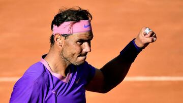 Spain's Rafael Nadal celebrates defeating Canada's Denis Shapovalov after their match of the Men's Italian Open at Foro Italico on May 13, 2021 in Rome, Italy. (Photo by Filippo MONTEFORTE / AFP)