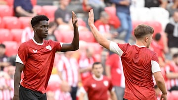 Athletic Bilbao's Spanish defender #19 Adama Boiro (L) and Athletic Bilbao's Spanish midfielder #18 Mikel Jauregizar Alboniga warm up before the UEFA Champions League first round day 1 football match between Athletic Club Bilbao and Arsenal at the San Mames stadium in Bilbao on September 16, 2025. (Photo by ANDER GILLENEA / AFP)