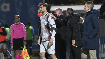 Llorente con Garitano antes de saltar al campo.