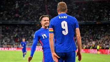 MUNICH, GERMANY - JUNE 07: Harry Kane celebrates with Jack Grealish of England after scoring their team's first goal from the penalty spot during the UEFA Nations League League A Group 3 match between Germany and England at Allianz Arena on June 07, 2022 in Munich, Germany. (Photo by Sebastian Widmann - The FA/The FA via Getty Images)