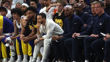 MINNEAPOLIS, MINNESOTA - MAY 14: Stephen Curry #30 of the Golden State Warriors watches from the bench against the Minnesota Timberwolves during the fourth quarter in Game Five of the Western Conference Second Round NBA Playoffs at Target Center on May 14, 2025 in Minneapolis, Minnesota. NOTE TO USER: User expressly acknowledges and agrees that, by downloading and or using this photograph, User is consenting to the terms and conditions of the Getty Images License Agreement. Ellen Schmidt/Getty Images/AFP (Photo by Ellen Schmidt / GETTY IMAGES NORTH AMERICA / Getty Images via AFP)