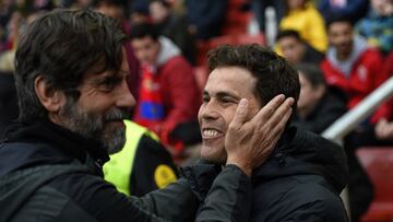 Quique Sánchez Flores y Rubi.