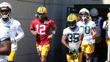 ASHWAUBENON, WI - JULY 30:  Green Bay Packers quarterback Aaron Rodgers (12) runs onto the field during Green Bay Packers training camp at Ray Nitschke Field on July 30, 2022 in Ashwaubenon, WI (Photo by Larry Radloff/Icon Sportswire via Getty Images)