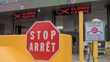 FILE PHOTO: Two closed Canadian border checkpoints are seen after it was announced that the border would close to &quot;non-essential traffic&quot;  to combat the spread of novel coronavirus disease (COVID-19) at the U.S.-Canada border crossing at the Tho