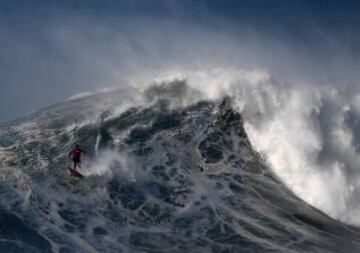 Rafael Tapia, bumping along, with a LOT of water coming in behind him...