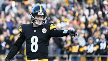 PITTSBURGH, PA - JANUARY 08:   Pittsburgh Steelers quarterback Kenny Pickett (8) points to a flag on the field during the game between the Pittsburgh Steelers and the Cleveland Browns at Acrisure Stadium on January 8, 2023 in Pittsburgh, PA. (Photo by Shelley Lipton/Icon Sportswire via Getty Images)