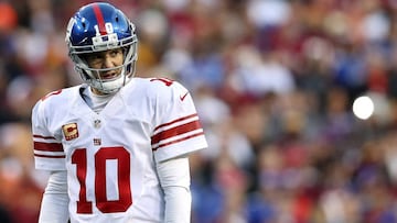 LANDOVER, MD - JANUARY 01: Quarterback Eli Manning #10 of the New York Giants looks on against the Washington Redskins in the first quarter at FedExField on January 1, 2017 in Landover, Maryland.   Patrick Smith/Getty Images/AFP
 == FOR NEWSPAPERS, INTERNET, TELCOS &amp; TELEVISION USE ONLY ==