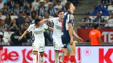 Tijuana's midfielder #19 Rafael Moral (L) celebrates with teammate Spanish defender #31 Unai Bilbao after scoring his team second goal during the Liga MX Clausura football match between Monterrey and Tijuana at the BBVA Stadium in Monterrey, Mexico on March 29, 2025. (Photo by Julio Cesar AGUILAR / AFP)