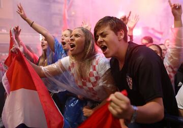 Soccer Football - World Cup - Semi-Final - Croatia v England - Zagreb, Croatia - July 11, 2018. Croatia's fan watches the broadcast of the World Cup semi-final match between Croatia and England in the fan zone. REUTERS/Antonio Bronic