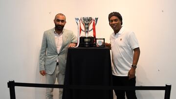 El director general de la UD Almeria Mohamed El Assy junto a Ronaldinho en la fiesta de inauguracion del Power Horse Stadium de Almería.