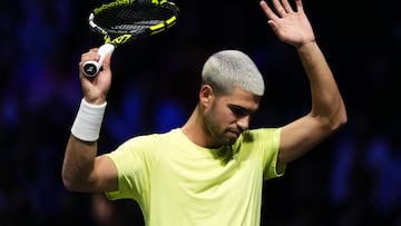 Spain's Carlos Alcaraz reacts as he plays against Britain's Cameron Norrie during their men's singles match on day two of the Paris ATP Masters 1000 tennis tournament at the Paris La D�fense Arena in Nanterre, on the outskirts of Paris, on October 28, 2025. (Photo by Dimitar DILKOFF / AFP)