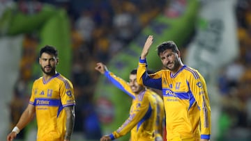 Tigres' French forward #10 Andre-Pierre Gignac (R) celebrates next to teammates after shooting a penalty kick and scoring his team's seventh goal during the Liga MX Apertura football match between Tigres and Puebla at the UANL University Stadium in San Nicolas de los Garza, Nuevo Leon state, Mexico on August 8, 2025. (Photo by Julio Cesar AGUILAR / AFP)