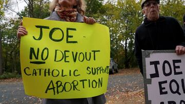 A protester holds an anti-abortion sign