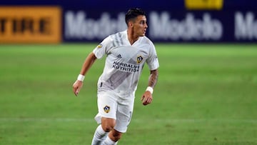 Oct 18, 2020; Carson, California, USA; Los Angeles Galaxy forward Cristian Pavon (10) controls the ball against the Vancouver Whitecaps during the first half at Dignity Health Sports Park. Mandatory Credit: Gary A. Vasquez-USA TODAY Sports