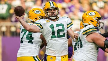 Nov 21, 2021; Minneapolis, Minnesota, USA; Green Bay Packers quarterback Aaron Rodgers (12) throws during the second quarter against the Minnesota Vikings at U.S. Bank Stadium. Mandatory Credit: Brace Hemmelgarn-USA TODAY Sports