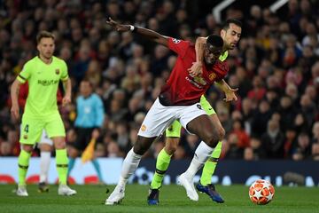 Paul Pogba y Sergio Busquets.