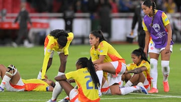 Colombian players react after losing the Women's Copa America 2025 final football match between Colombia and Brazil at the Rodrigo Paz Delgado Stadium in Quito on August 2, 2025. (Photo by Rodrigo BUENDIA / AFP)