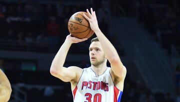 Feb 3, 2017; Auburn Hills, MI, USA; Detroit Pistons forward Jon Leuer (30) shoots during the first quarter as Minnesota Timberwolves center Karl-Anthony Towns (32) defends at The Palace of Auburn Hills. Mandatory Credit: Tim Fuller-USA TODAY Sports