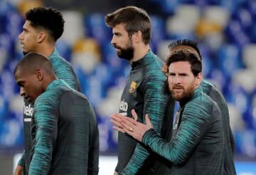 Barcelona's Lionel Messi, Gerard Pique and teammates during training.