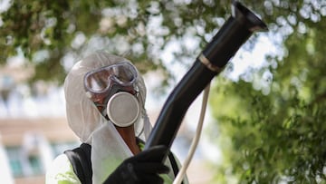 Authorities are tackling the mosquito-borne virus with mass fumigation, drone surveillance, and fines for households who don’t pour away standing water.