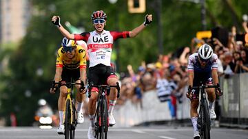 MONTREAL, QUEBEC - SEPTEMBER 11: Tadej Pogacar of Slovenia and UAE Team Emirates celebrates winning ahead of Wout Van Aert of Belgium and Team Jumbo - Visma, Andrea Bagioli of Italy and Team Quick-Step - Alpha Vinyl during the 11th Grand Prix Cycliste de Montreal 2022 a 221km one day race from Montreal to Montreal / #GPCQM / #WorldTour / on September 11, 2022 in Montreal, Quebec. (Photo by Dario Belingheri/Getty Images,)